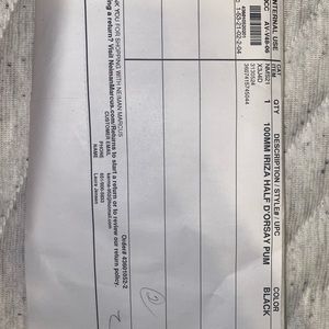 Iriza Pointy Toe Half D’Orsay Pump.                  Christian Louboutin